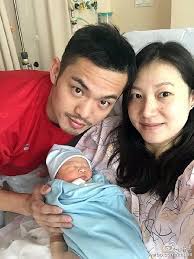 Lin Dan, his wife, and their newborn baby. The cheating videos were taken just a few weeks before she gave birth to their baby. 